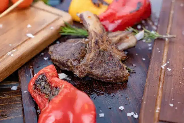 Grilled lamb chops with roasted red peppers