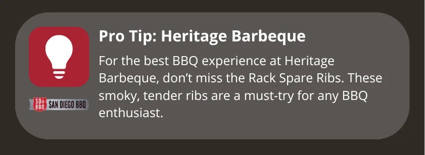 We recommend the rack spare ribs at Heritage Barbeque in Oceanside for those seeking a smoky, tender BBQ dish.